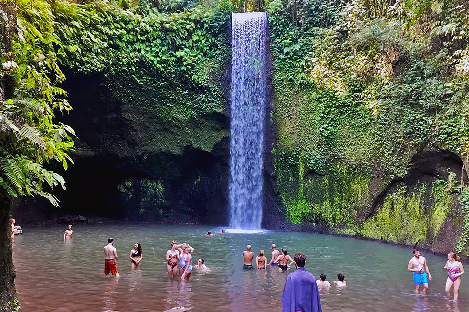 Swimming the Natural Pool of Tibumana Waterfall Ubud