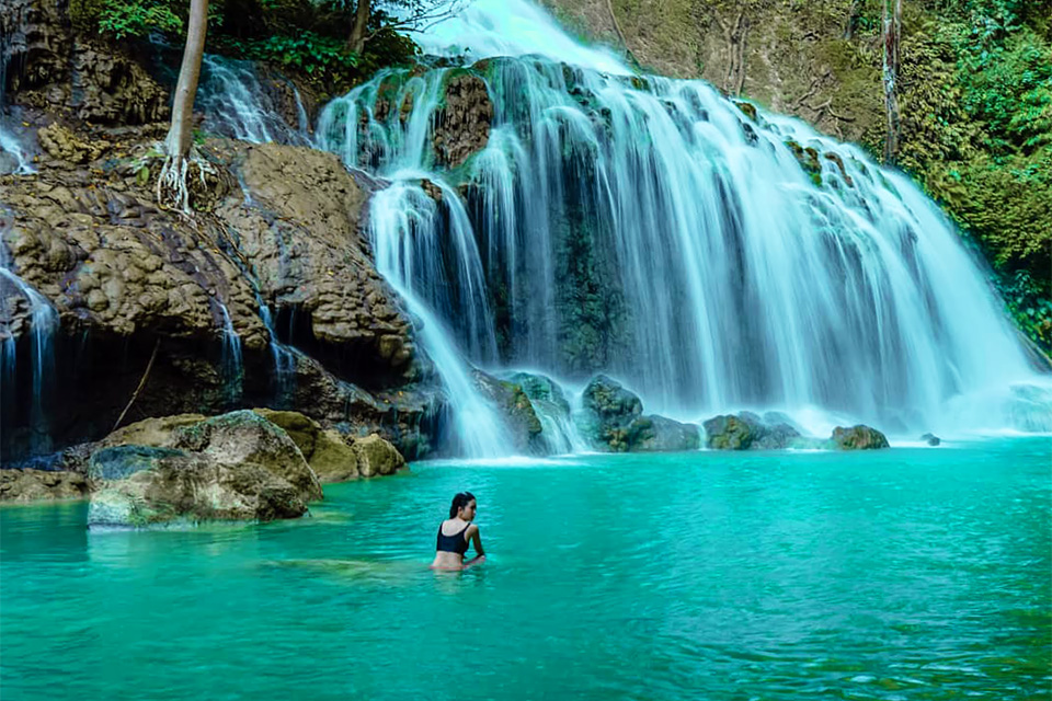Lapopu Waterfall Sumba Guide Swimming Girl