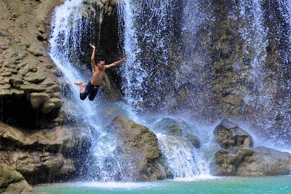 Lapopu Waterfall Visitors Guide Jumping