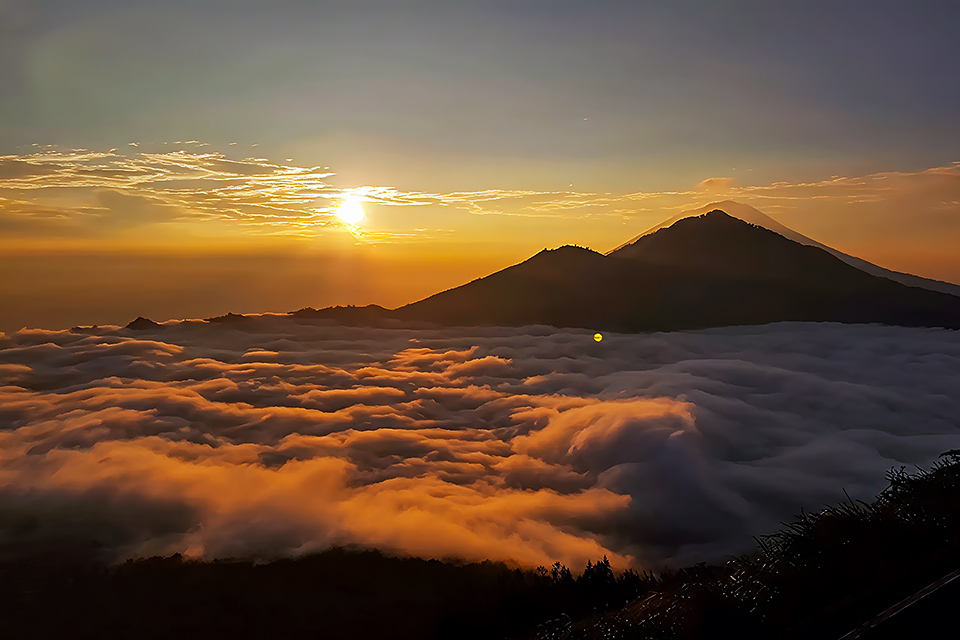 Sunrise Above the Cloud at the Peak of Mount Batur
